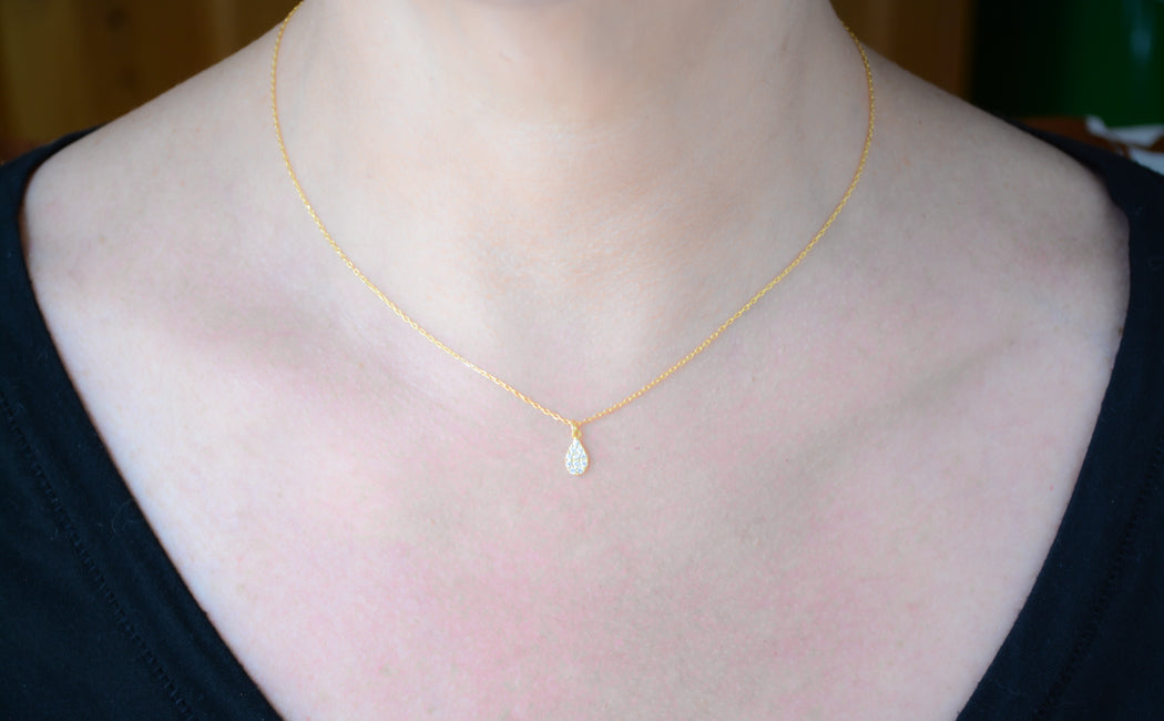 Gold necklace with cubic zirconia teardrop