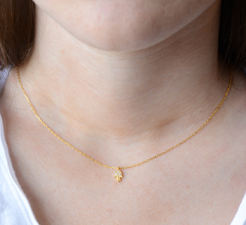Gold necklace with cubic zirconia Hamsa