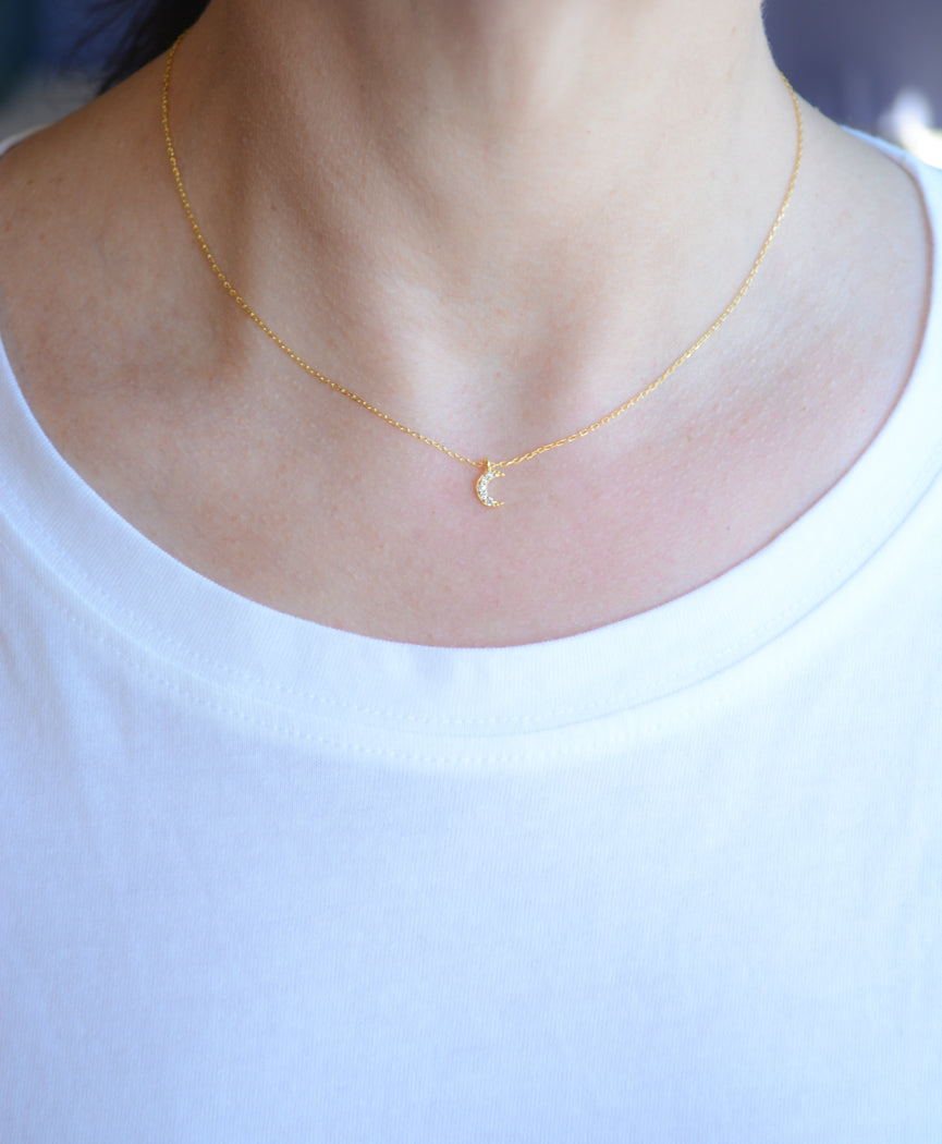 Gold necklace with cubic zirconia moon pendant