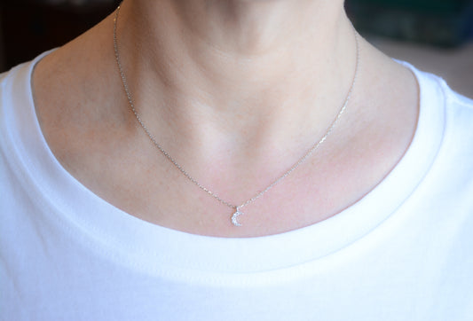 Silver necklace with cubic zirconia moon pendant