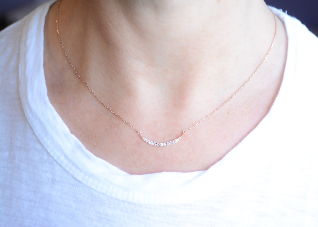 Delicate rose gold and cubic zirconia crescent necklace