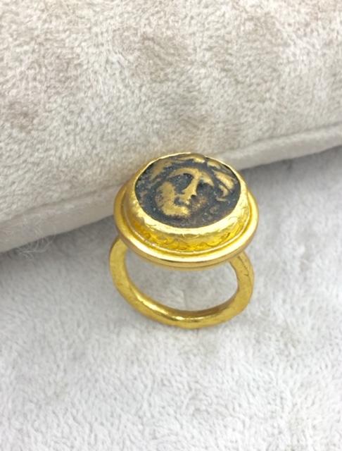 Adjustable coin ring