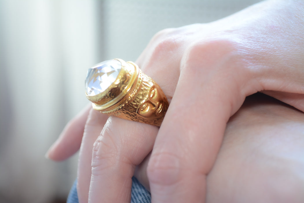 Adjustable gold coin ring with faceted clear crystal