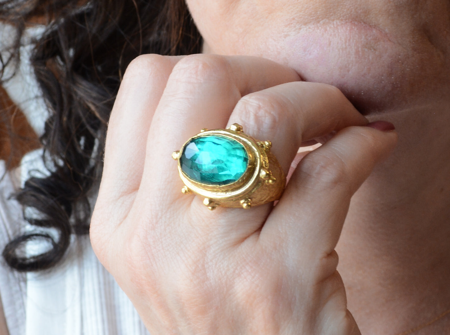 Adjustable gold coin ring with faceted emerald crystal